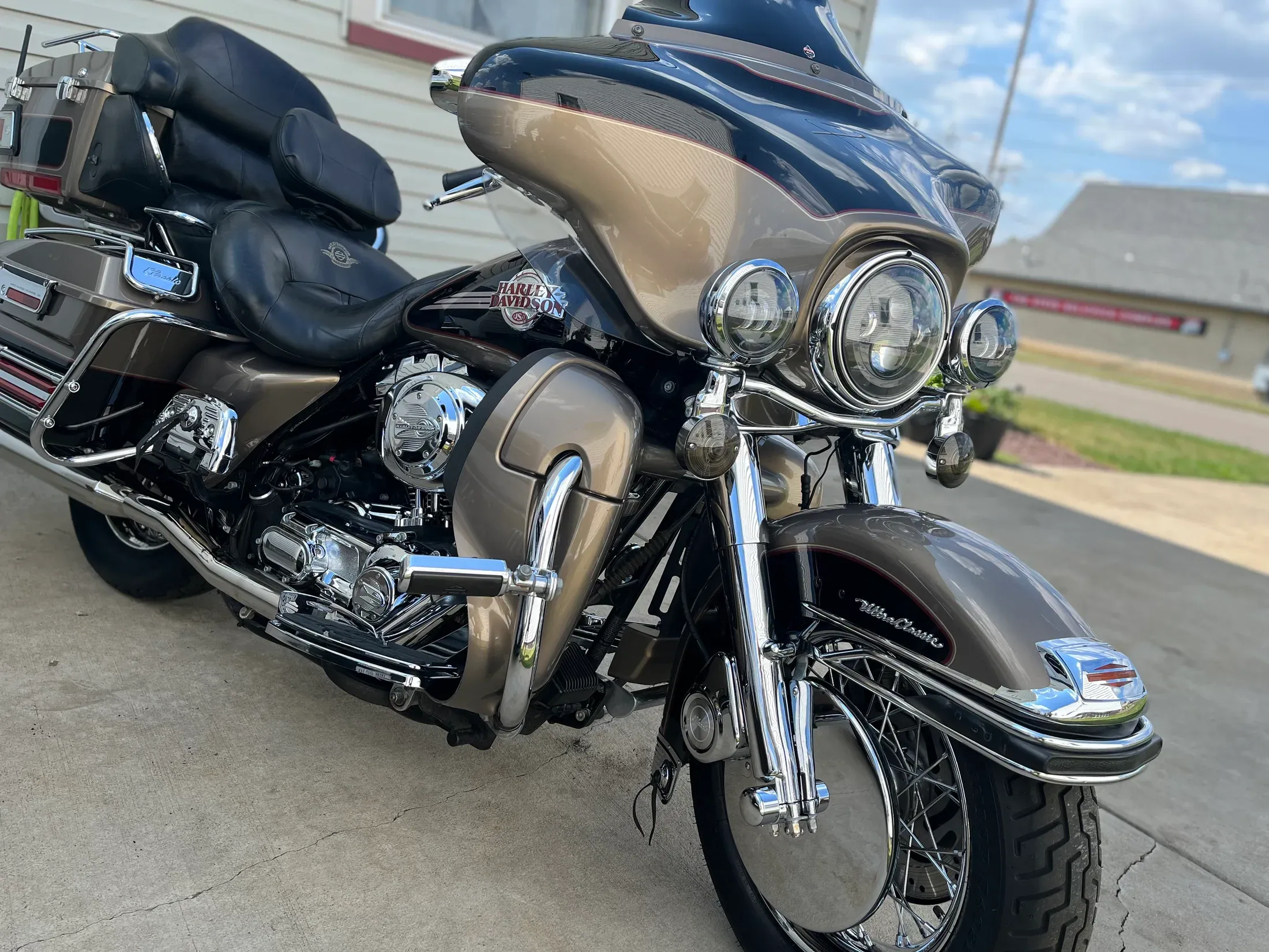Detailed black Harley-Davidson touring motorcycle viewed from the side.