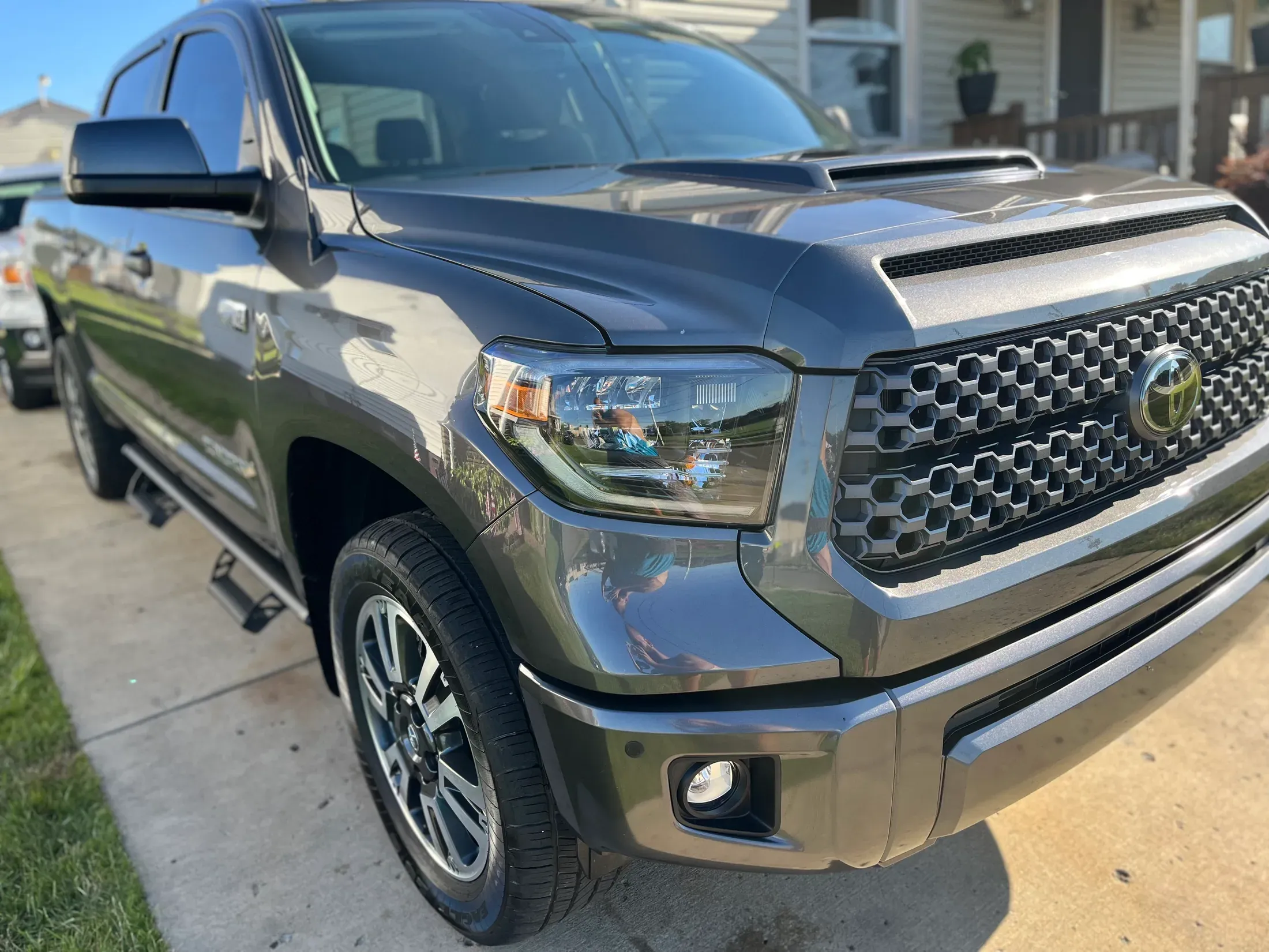 Detailed gray Toyota Tundra TRD Sport viewed from the front quarter.