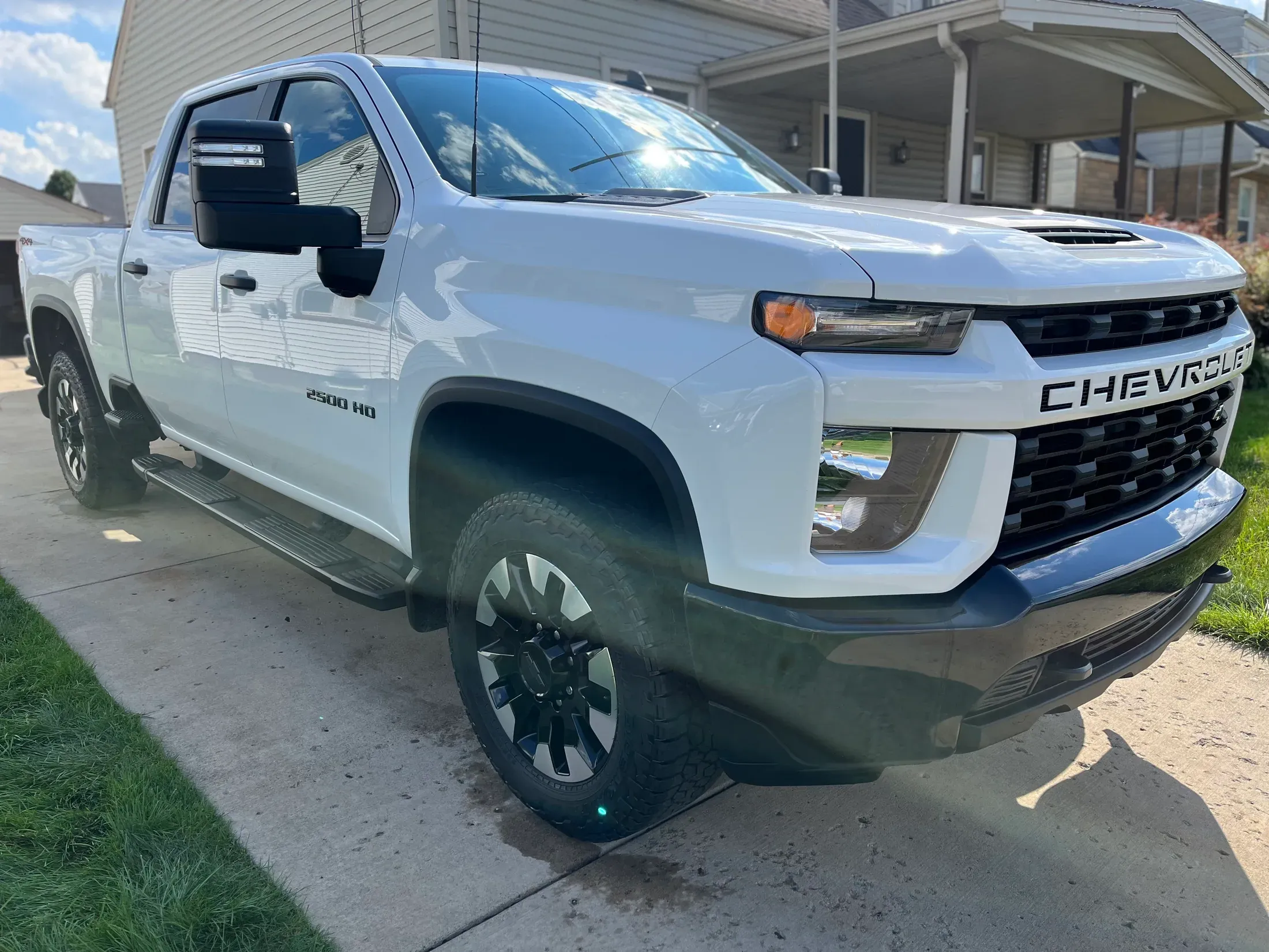 Detailed white Chevrolet Silverado HD from the front.